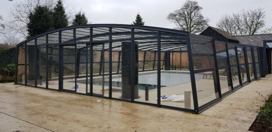 large glass pool enclosure